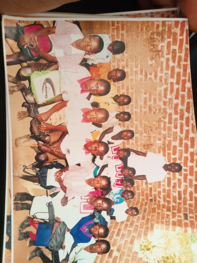 Primary Pupils with Uniforms & Notebooks